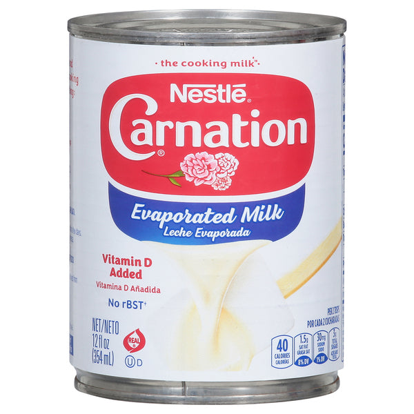 Original single Carnation 12 fl oz can detail photo; listing includes 12 cans